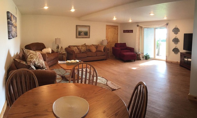 Palmetto Apartment | Beautiful Pet Friendly Island Waterfront Apartment, 100Ft Fishing Dock and Tiki.