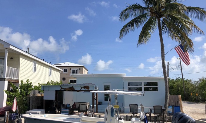 Key Largo Village House | Beautiful Remodeled Home on the Water! 40 ft dock & short walk to private beach!