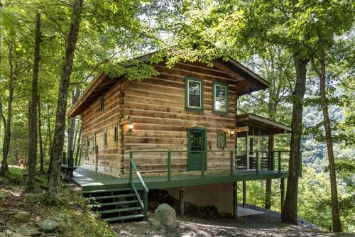 Marshall House | Beautiful Rustic Cabin Surrounded by Nature with Incredible Views and a Wrap-Around Deck for an Amazing Glamping Experience in Marshall, NC