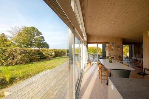 Grenaa House | Beautiful Setting By The Sea With Light And Sky