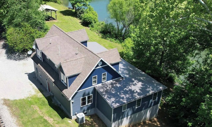 Tallmansville House | Beautiful updated River cottage in rural Upshur County. Backroads and backwoods for miles with high speed internet, four bedrooms and 3.5 baths.