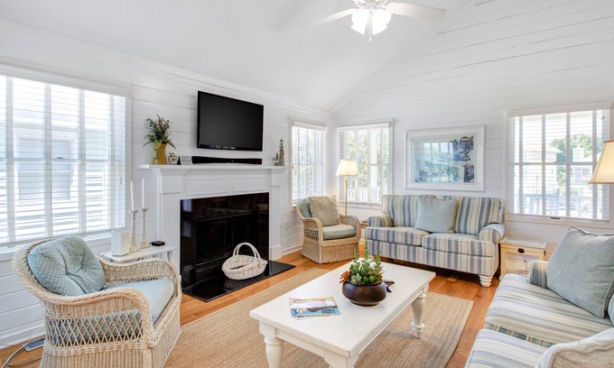 Pelican Bay House | Beautifully decorated cottage steps from the beach with pool & open layout