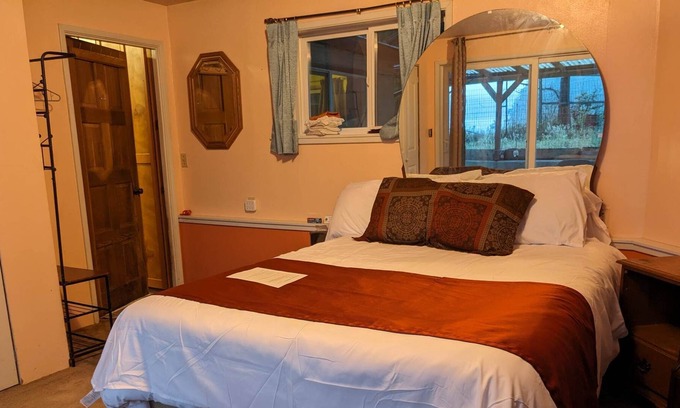 Marrowstone Cabin | Bed and a twin bed, bedroom individual, entrance and exit to private beach
