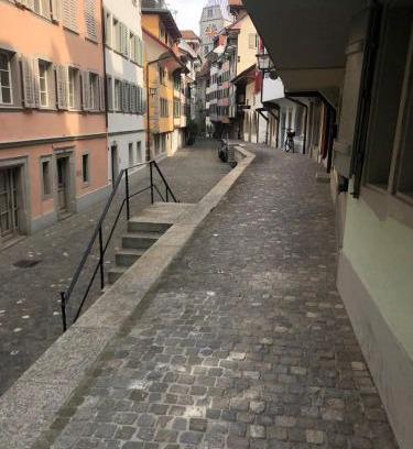 Zug House | Bedroom cum office with shared shower in Zug's Old Town