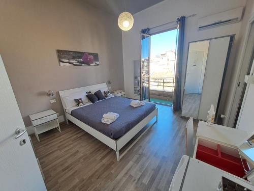 Corso dei Mille - Sant'Erasmo Bed & Breakfast | Bedroom la stazione