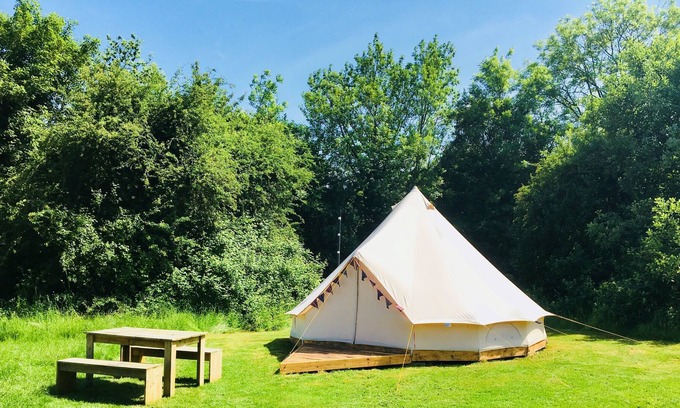 Whichford RV Rental | Bell Tent - fitted with wood-burning stove & double bed