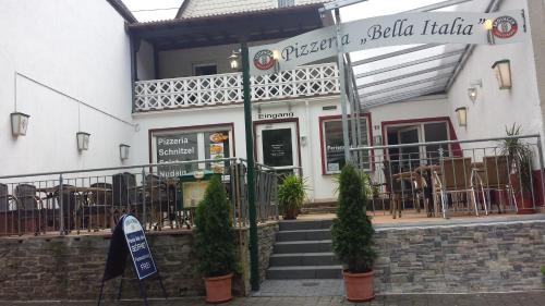 Bruttig House | Bella Italia - Ferienwohnungen