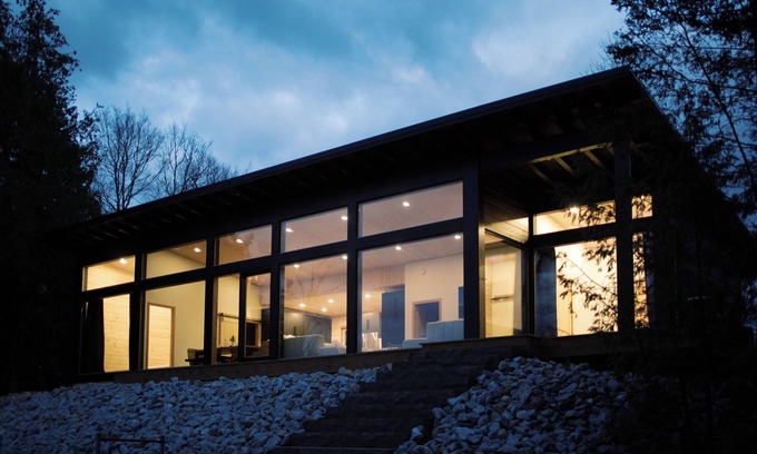 North Frontenac Cottage | Bellevue: A cozy, Scandinavian-style cottage nestled on a hill.