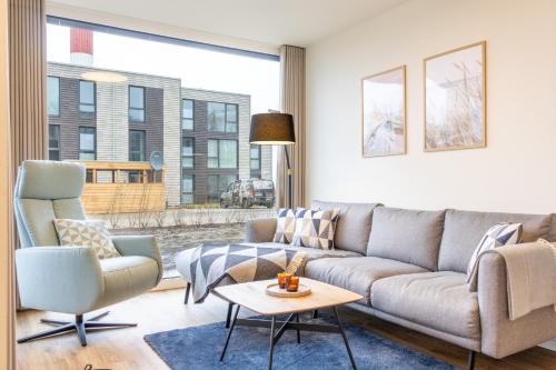 Marienleuchte Apartment | BeltBlick 19 – Exklusive Ferienwohnung mit Garten und Meerblick