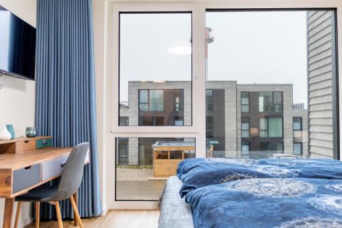 Marienleuchte Apartment | BeltBlick21 - Familienfreundliche Ferienwohnung mit Sauna & Meerblick!