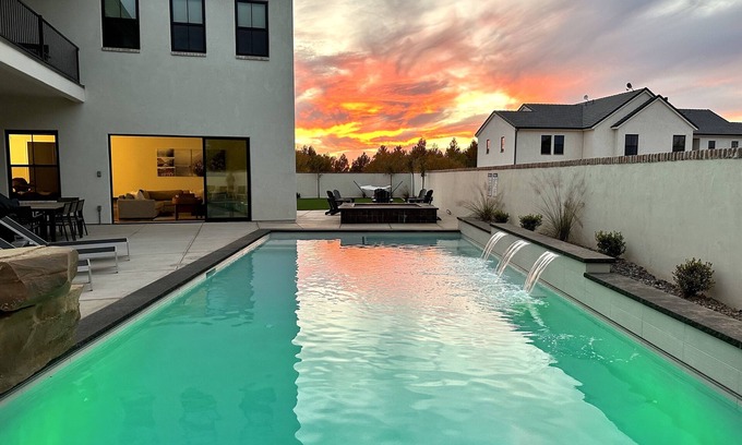 Hurricane Villa | Black Ridge Villa near Sand Hollow & Zions. Sleeps 32. Private pool & hot tub.
