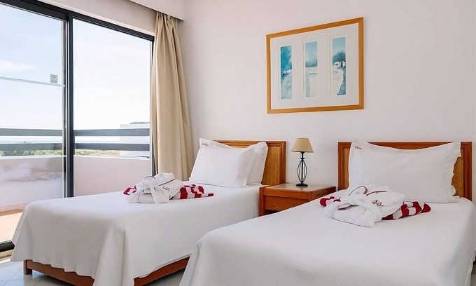 Areias de Sao Joao Hotel | Blissful Getaway! Full Kitchen and Balcony, Swimming Pool, Near Oura Beach!