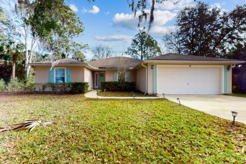Palm Coast House | Blooming Paradise