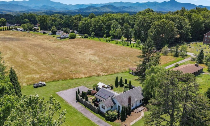 Candler Cottage | Blue Ridge mountain views over a flowing meadow, hot tub, stars, private garden