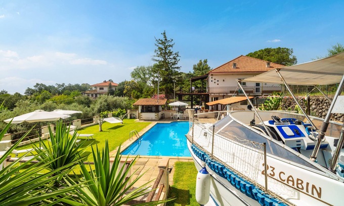 Piedimonte Etneo Boat Rental | Boat 'Etna House' with Sea View, Wi-Fi and Air Conditioning