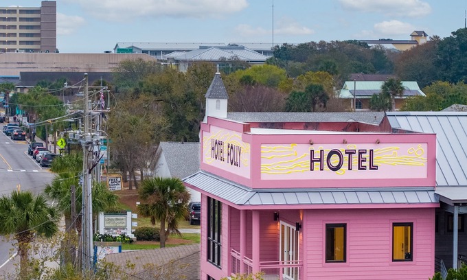Folly Beach Hotel | Boutique Hotel Folly Room 4: King Studio - cozy porch views of the Folly River
