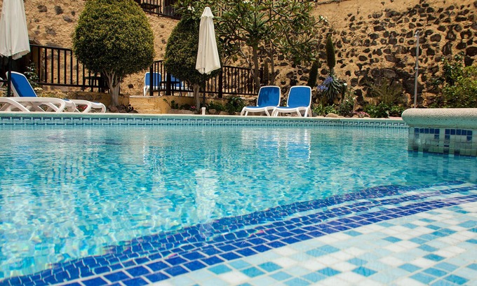 El Rincon Cottage | Boutique self catering cottage with saltwater heated pool, gardens, in mountains