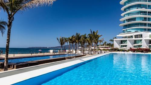 Flamingos Apartment | Brand New Condo Aria Ocean 501 by Kivoya