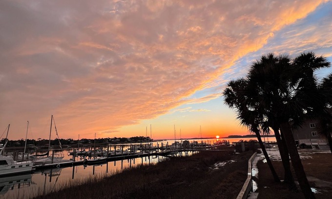 Folly Beach Condo | Breathtaking panoramic waterfront views, 15 minute walk to downtown with pool!