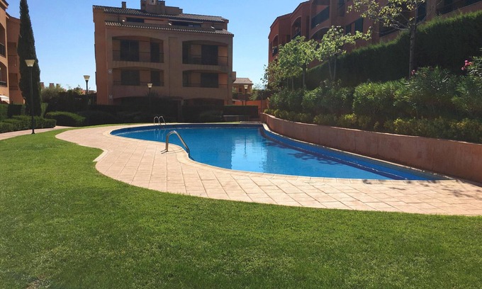 L Almadrava Apartment | Bright 2BR Apartment with Pool, Near Stunning Cala Beaches, Parking & AC