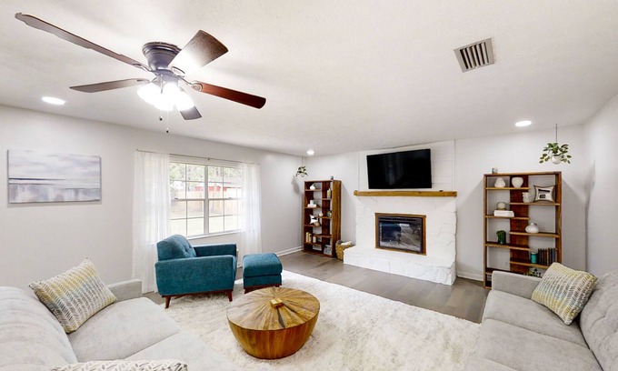Southside House | Bright and modern home with a large yard, grill, air hockey table, & fireplace
