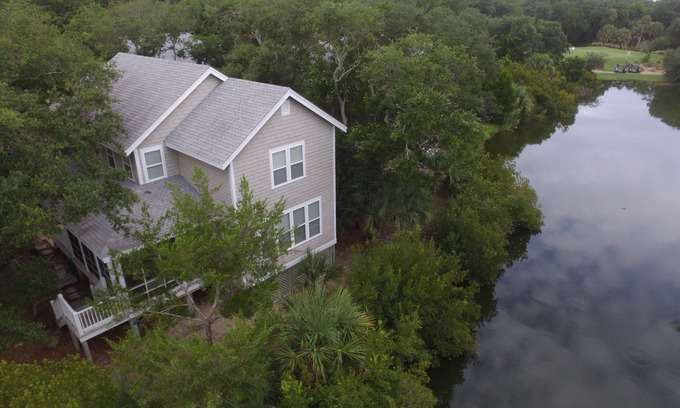 Sabal Palm Cottages House | Bright Pristine Cottage Sleeps 8 Shoals and Bhi Club New Bintelli Carts