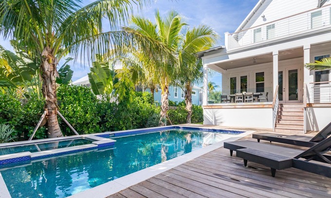 Longbeach Village House | Broadway Retreat: Luxurious 4 BR / 4.5 BA pool home with guest house.
