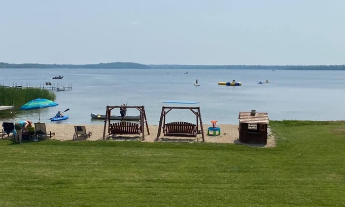 Hines Resort | Cabin 1 Lakefront Screen Patio Beach Dock Resort Amenities Resort Amenities Fish