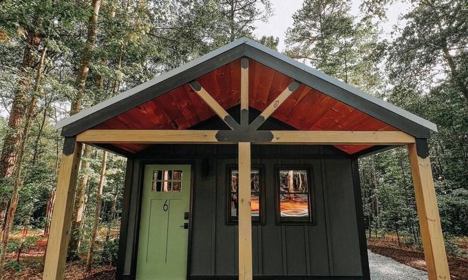 Hartwell RV Rental | Cabin #6: Studio style layout with kitchenette and a large gravel parking pad beside the cabin for easy boat or trailer storage.