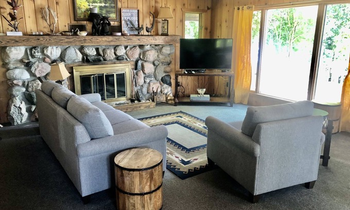 Suttons Bay House | Cabin-style home near Suttons Bay. West Bay beachfront. Fireplace. Central AC