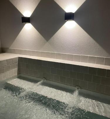 Calheta House | Calheta Suites - Vinha & Jardim - Adults-only suites met hottub & zeezicht