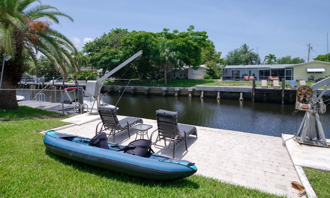 Cypress Lakes House | Canal-front home with pool, dock, patio, grill, sundeck, AC & washer/dryer