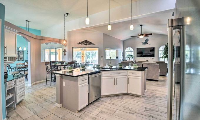 Palm Coast House | Canal-Front Palm Coast Home w/Pool, Theater Room!
