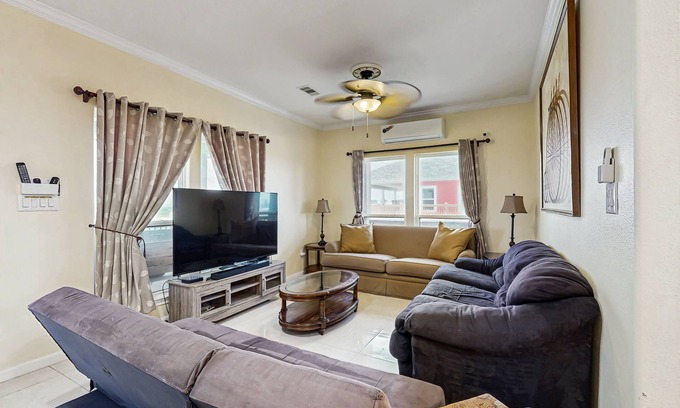 Port Bolivar House | Canal-Front Retreat with Private Boat Ramp, Hot tub, WIFI and dog-friendly