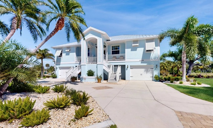 Cape Haze House | Canal-side monthly rental with private dock, heated pool, kayaks, & beach access