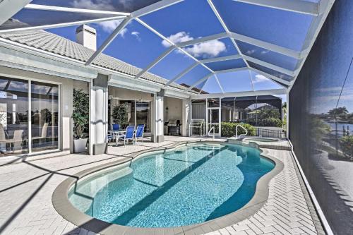Pelican House | Canalfront Pool and Hot Tub Home in Cape Coral