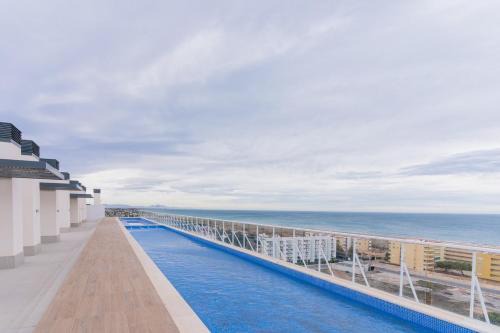 Canet de Berenguer Apartment | Canet Seaview Gem: Pool & Beach Proximity