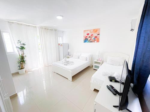 Bavaro Hotel | Caribbean Mojito Studios HOTEL WiFi Los Corales BEACH CLUB & SPA