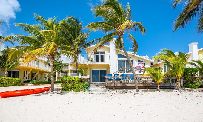 South Sound Villa | Caribbean Paradise – Beachfront Villa South Sound Beauty and Resort Amenities