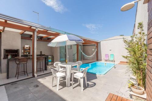 Matinhos House | Casa a 700m da Praia com Piscina Aquecida e Churrasqueira