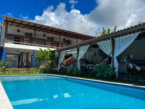 Arraial d'Ajuda Hotel | Casa Brisa - WIFI; PISCINA e Café da Manhã a 520m do Centro de Arraial