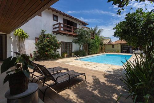 Praia Rasa House | Casa com 4 Suítes e Piscina em Búzios | PZ 1214