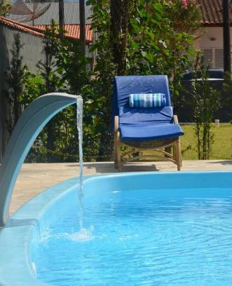 Balneario Mogiano House | Casa com piscina 500m da praia condomínio Morada da Praia