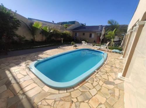 Guaratuba House | Casa com Piscina a 500m da Praia Ideal para Famílias em Guaratuba