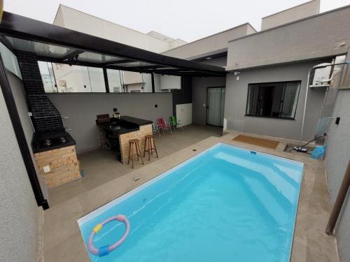 Barra Velha House | Casa com piscina e espaço gourmet 300m do mar