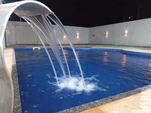Aracati House | Casa com Piscina, hidromassagem e churrasqueira.