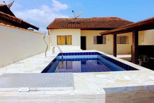 Balneario Mogiano House | Casa com piscina no litoral norte