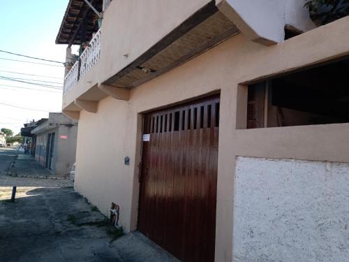 Palmeiras House | Casa conceito aberto aconchegante, perto de tudo e com garagem 64m2