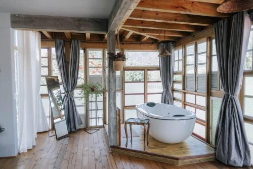 Pinheira House | Casa das Janelas