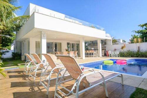 Praia de Barequecaba House | Casa de alto padrão, com 5 suítes, a 50m praia de Barequeçaba